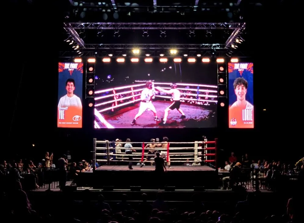 Stage lighting and LED video walls for The Fight charity boxing event